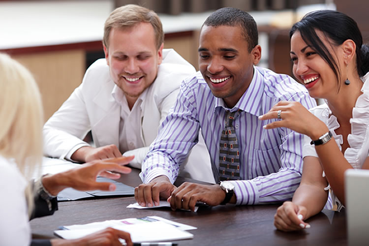 group meeting around a table
