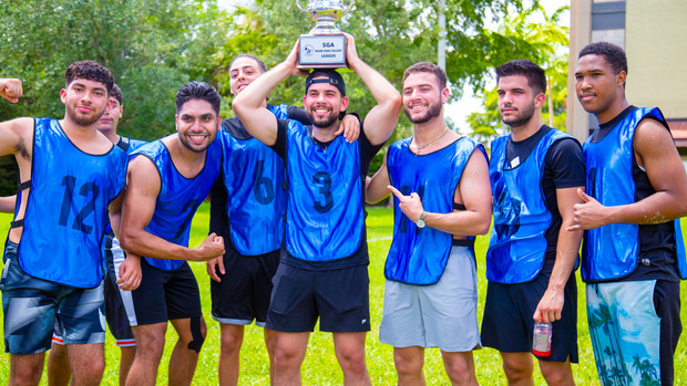 Group of Hialeah Students Soccer team with their winning trophy