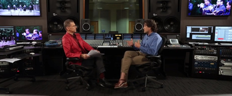 Interview with two men siting in a recording studio
            