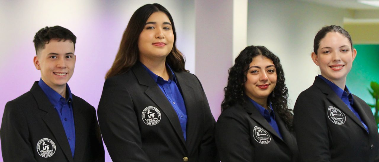A group of student invovled in student government pose for a picture
